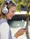 Woman learning Irish on her iPod with Buntus Cainte for iPod 